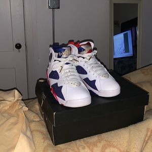 Size 7 1/2 Air Jordan 7 Retro red, white , blue & metallic gold.
